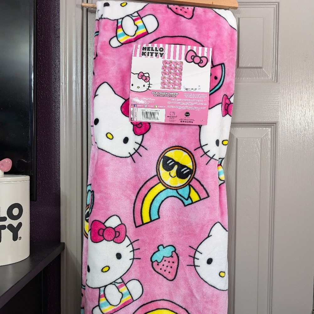Hello Kitty pink rainbow blanket